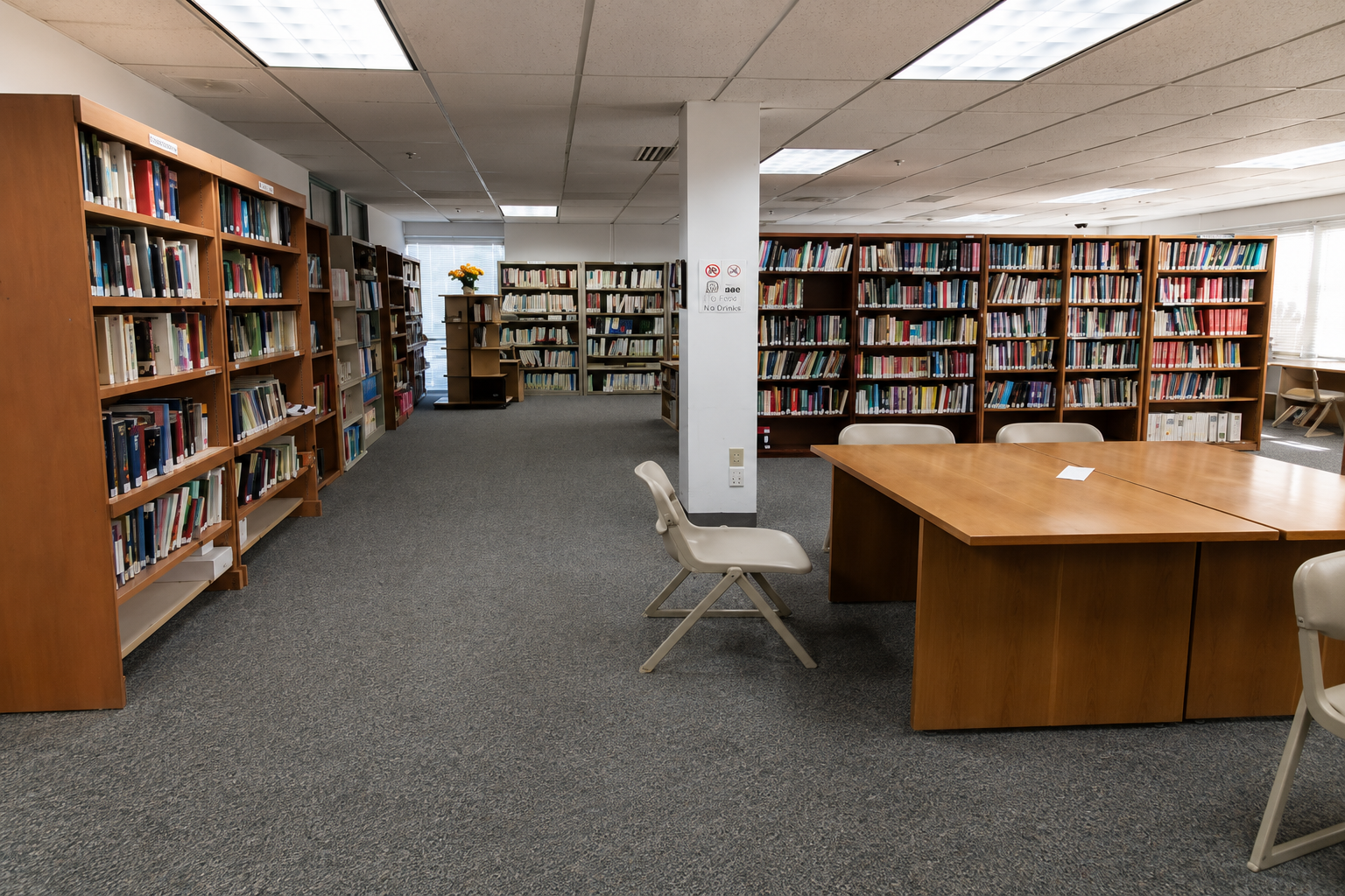 UEWM Student Library University of East-West Medicine student library with bookshelves, study tables, and academic resources